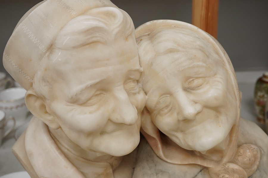 Eugenio Battiglia, (Florentine, fl. late 19th century), a carved alabaster bust of an elderly couple, 36cm high